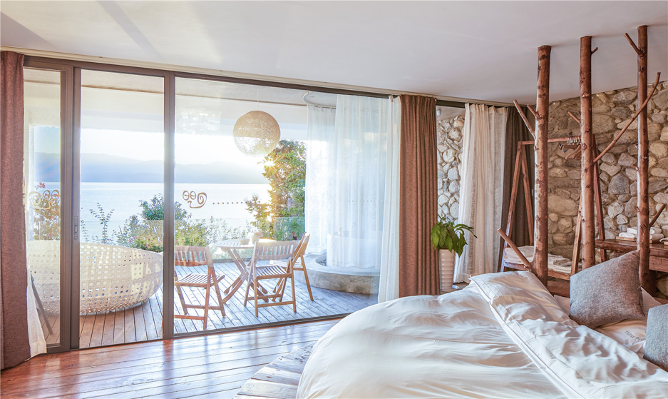 原木風(fēng)格民宿裝修設(shè)計(jì),回歸自然之美